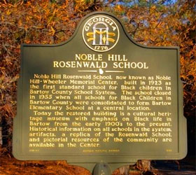 Marker at Noble Hill-Wheeler Memorial Center